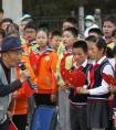 让广大中小学生在歌声中重温百年党史